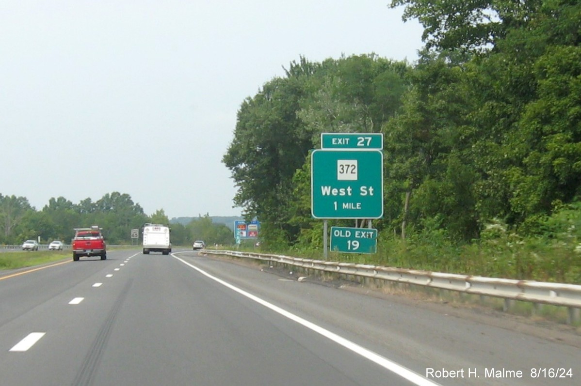 Image of 1 Mile advance sign for CT 372 exit with new milepost based exit number and separate Old Exit 19 
      sign in front on CT 9 North in Cromwell, August 2024