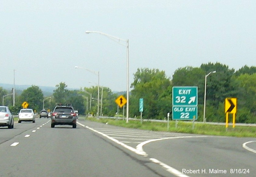 Image of gore sign for US 5/CT 15 South exit with new milepost based exit number and 
      separate New and Old Exit signs in front on CT 9 North in Berlin, August 2024