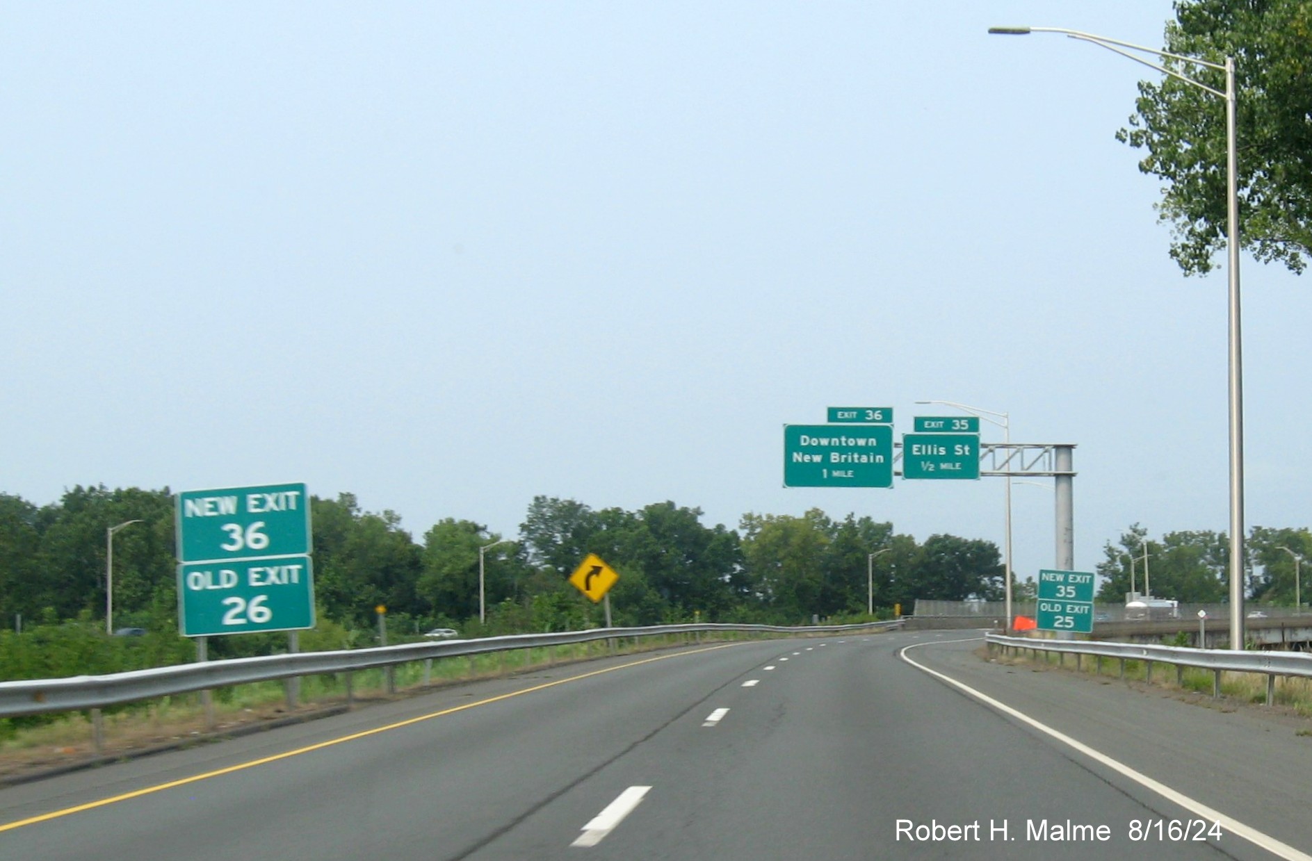 Image of 1 mile advance sign for CT 71 South exit with new milepost based exit number and 
      separate New and Old Exit signs in front on CT 9 North in Berlin, August 2024