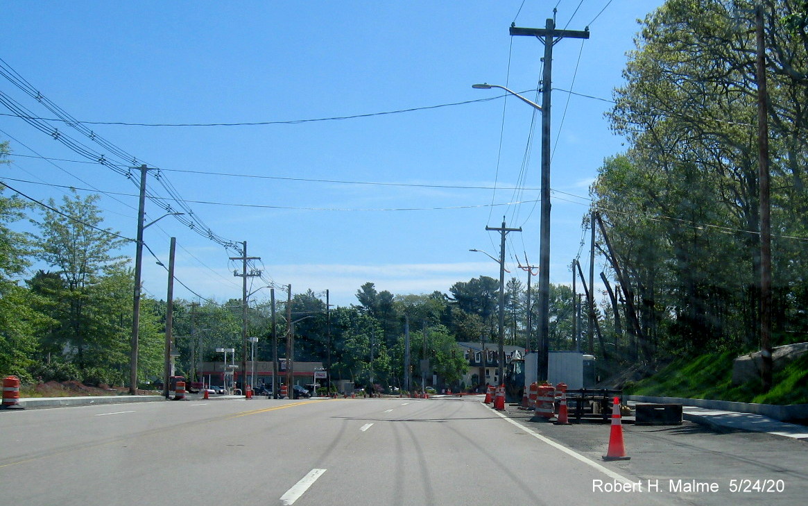 Image of construction work continuing to widen south side of Derby Street approaching intersection with MA 53/Whiting Street in Hingham, May 2020