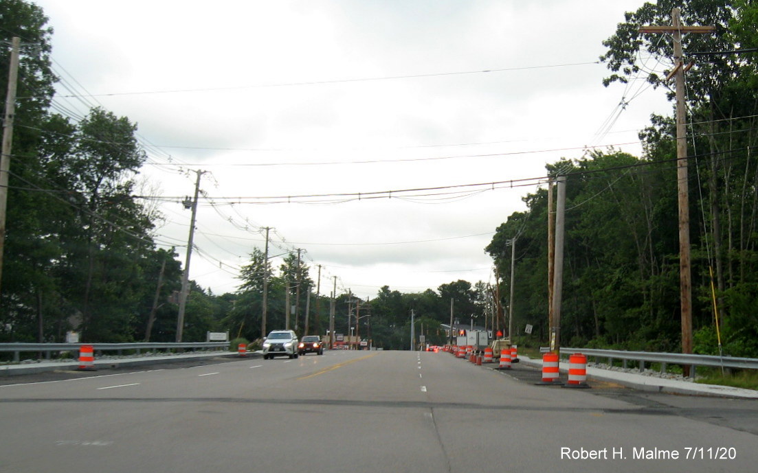 Image of remaining utility poles in widened Derby Street right-of-way looking east from Recreation Park Drive, July 2020