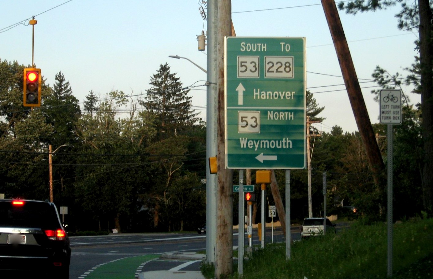 Newly placed new 2 post MassDOT guide sign headed east for intersection of Derby Street and Whiting Street in Hingham, July 2021