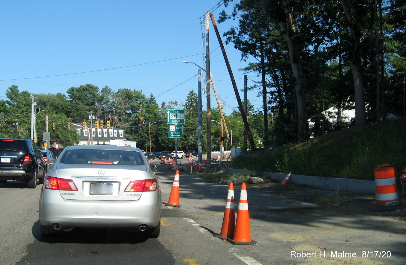 Image of Derby Street looking east showing progress in widening roadway approaching Whiting Street (MA 53) intersection, August 2020