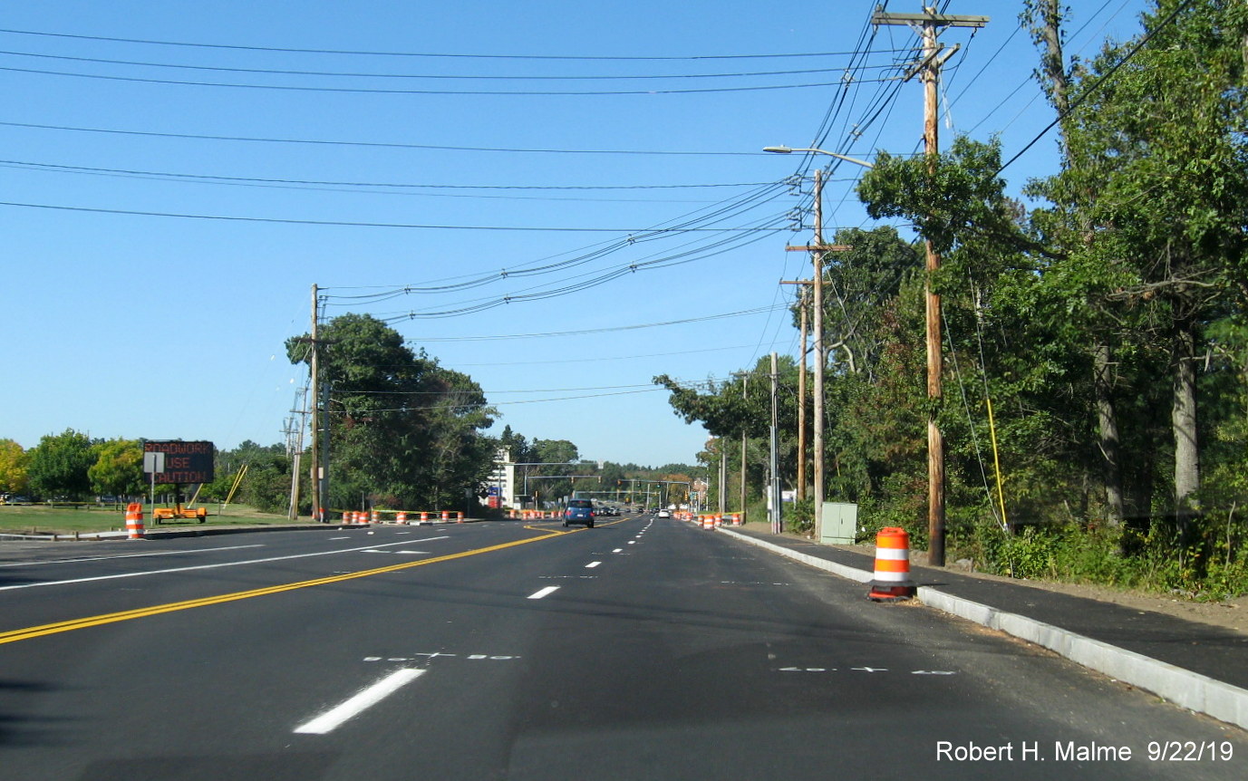 Image of newly paved widened Derby Street looking west beyond Cushing Street intersection in Hingham on Sept. 21, 2019