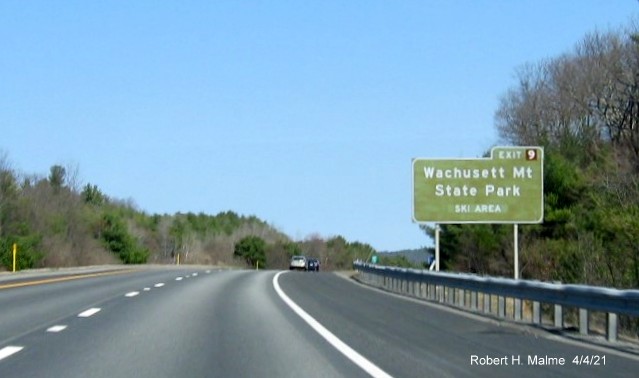 Image of brown attractions sign for MA 140 exit with new milepost based exit number on I-190 North in Princeton, April 2021