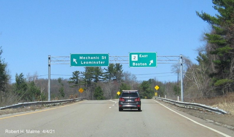 Image of overhead signage on ramp to MA 2 East with new milepost based exit number in Leominster, April 2021