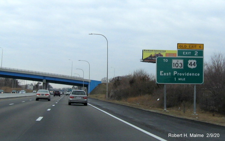 Image of ground mounted 1-mile advance sign for To RI 103/US 44 East exit with new milepost exit number and yellow old exit number tab on I-195 West in East Providence