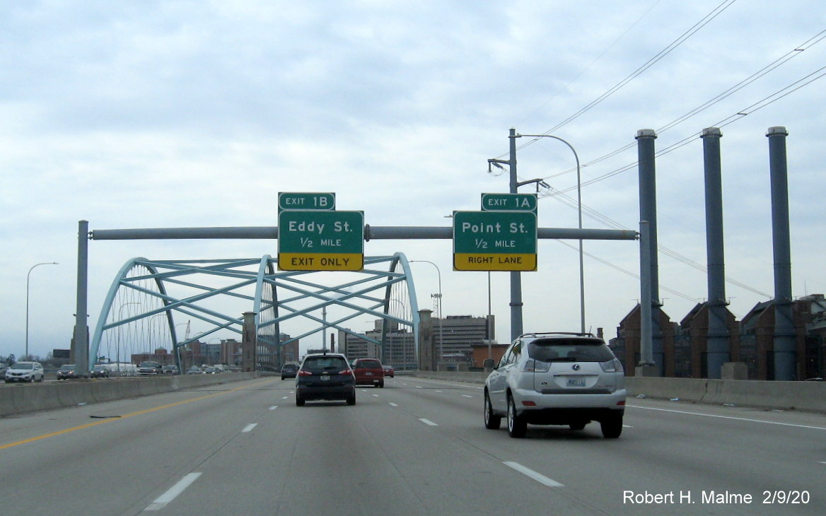 Image of overhead sign gantry with last two exits on I-195 West before it ends at I-95 in Providence, RI
