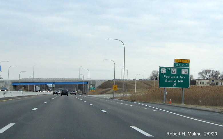 Image of ramp sign for US 6 exit with new milepost based exit number and yellow old exit number tab on I-195 East in East Providence