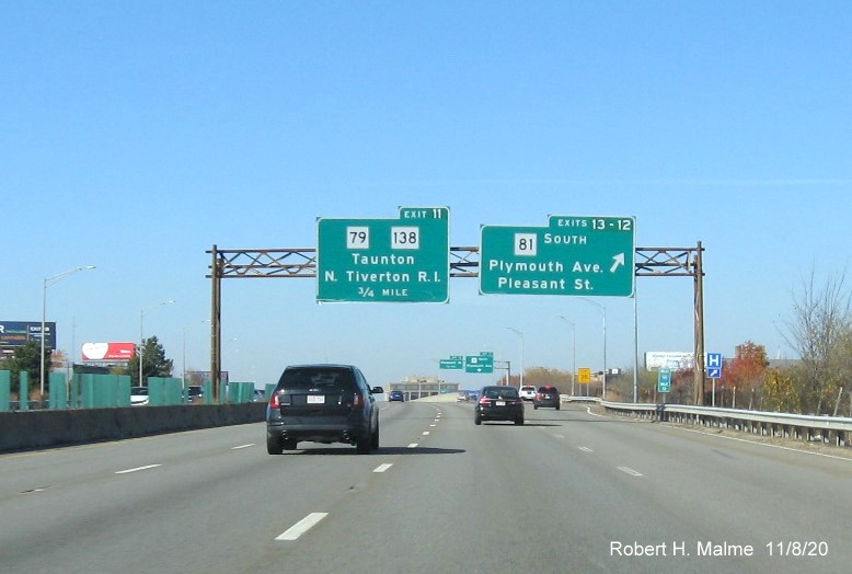 Image of older overhead signs at ramp to MA 81 South with new milepost based exit numbers on I-195 West in Fall River, November 2020