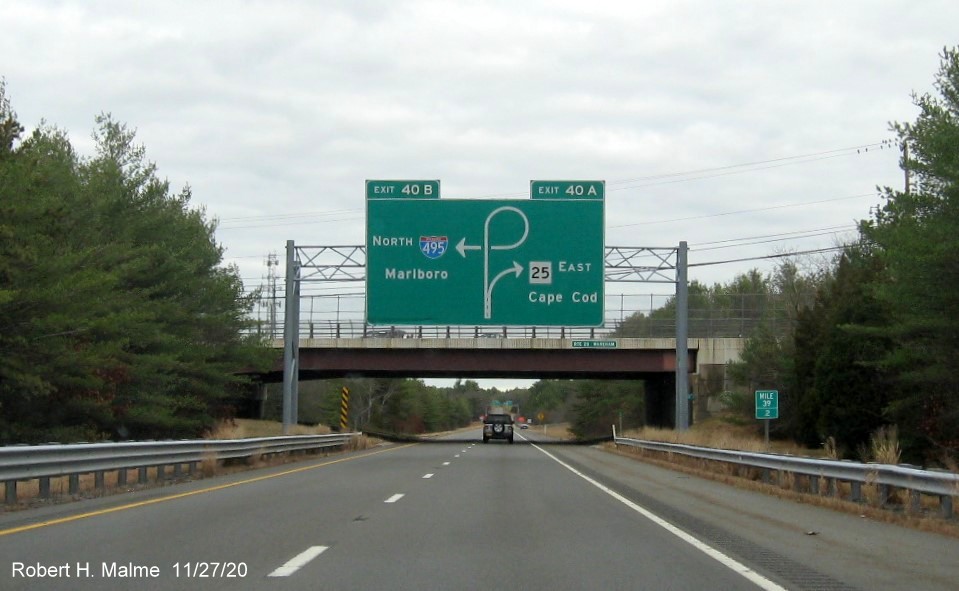 Image of 1/2 mile advance overhead sign for I-495 North/MA 25 East ramps with new milepost based exit numbers at end of I-195 East in Wareham, November 2020