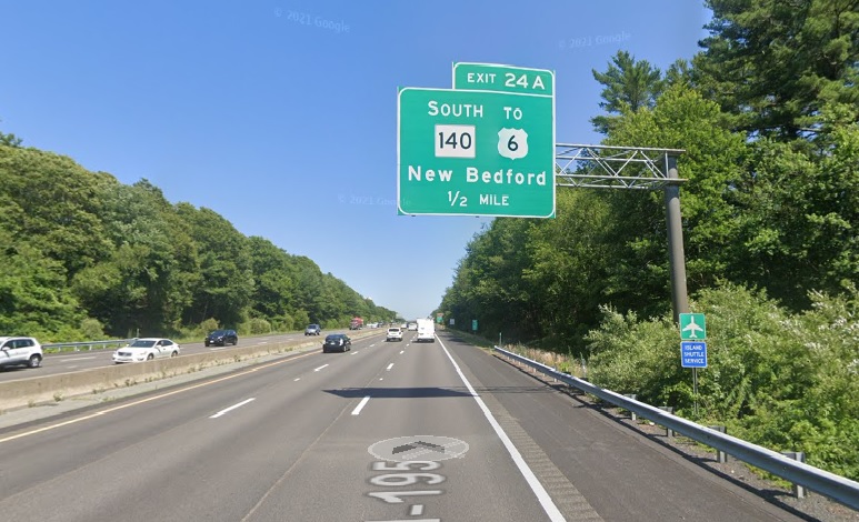 Google Maps Street View image of 1/2 mile advance overhead sign for South MA 140 exit with new milepost based exit number on I-195 East in New Bedford, July 2021