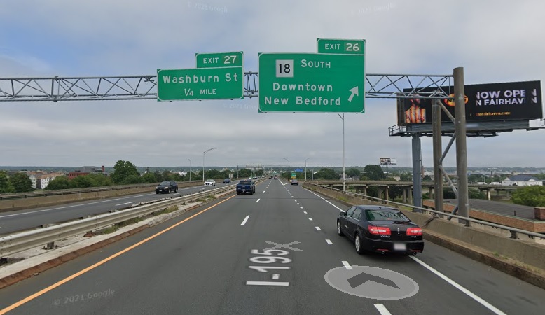 Google Maps Street View image of overhead ramp sign for MA 18 South exit with new milepost based exit number on I-195 East in New Bedford, July 2021