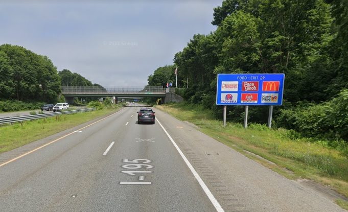 Google Maps Street View image of blue Food Services sign for MA 240 South exit with new milepost based exit number on I-195 East in Fairhaven, July 2021