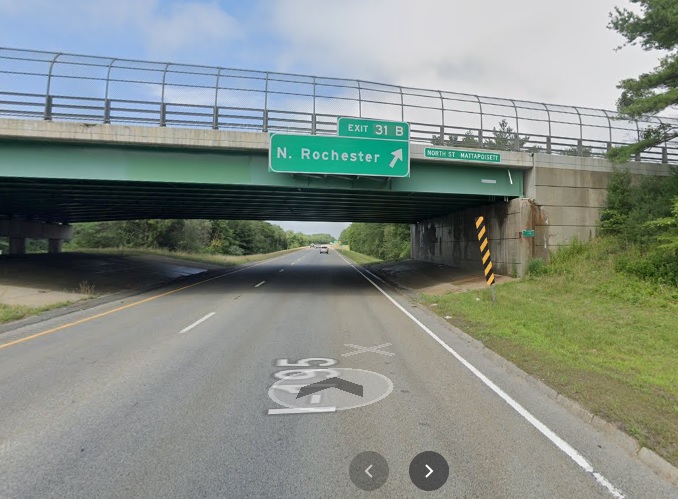 Google Maps Street View image of overhead ramp sign for N. Rochester exit with new milepost based exit number on I-195 East in Mattapoisett, July 2021