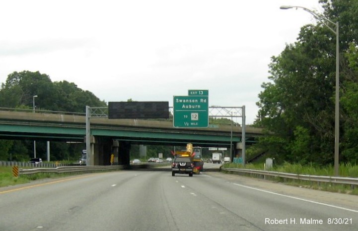 Image of 1/2 mile advance overhead sign for Swanson Road exit with new I-395 milepost exit number on I-290 East in Auburn, August 2021