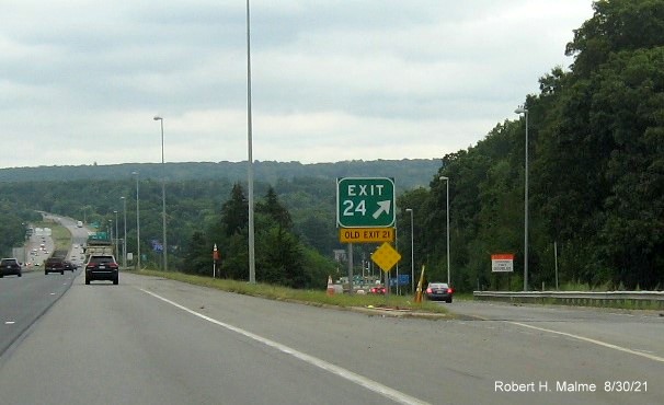 Image of overhead ramp sign for Main Street exit with new I-395 milepost based exit number on I-290 East in Worcester, August 2021
