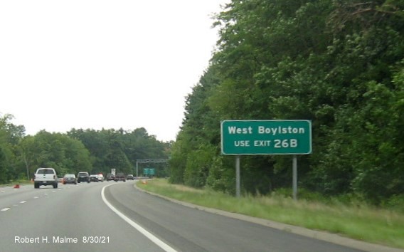 Image of auxiliary sign for MA 140 North exit with new I-395 milepost based exit number on I-290 East in Shrewsbury, August 2021
