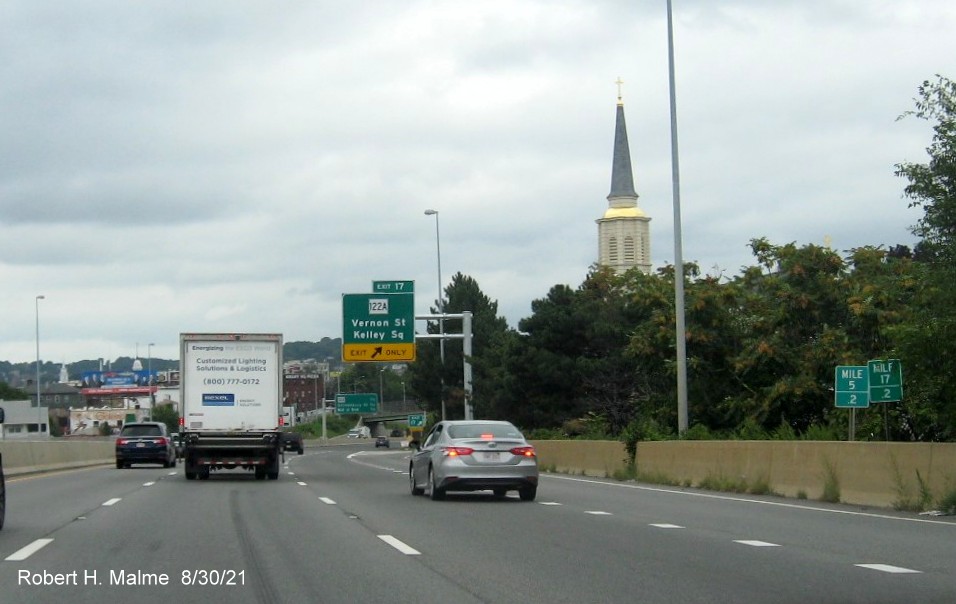 Image of recently placed overhead ramp sign for MA 122A / Kelley Square exit with new I-395 milepost based exit number on I-290 East in Worcester, August 2021