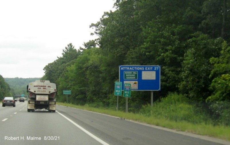 Image of blue attractions sign for Church Street exit with new I-395 milepost based exit number on I-290 East in Boylston, August 2021
