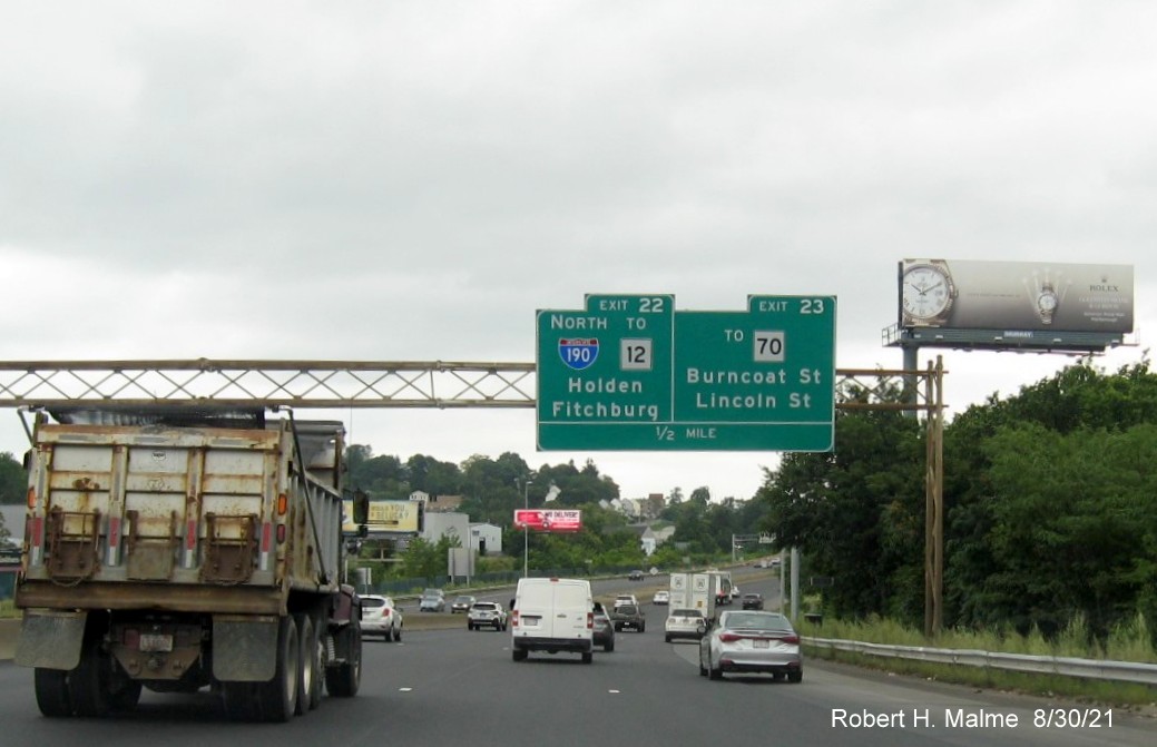 Image of old 1/2 mile advance signs for North I-190/MA 70 exits with new I-395 milepost based exit numbers on I-290 East in Worcester, August 2021