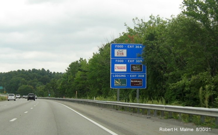 Image of blue Food/Attractions sign for both Hudson Street/Solomon Pond Mall Road exit with new milepost based exit number on I-290 East in Boylston, August 2021