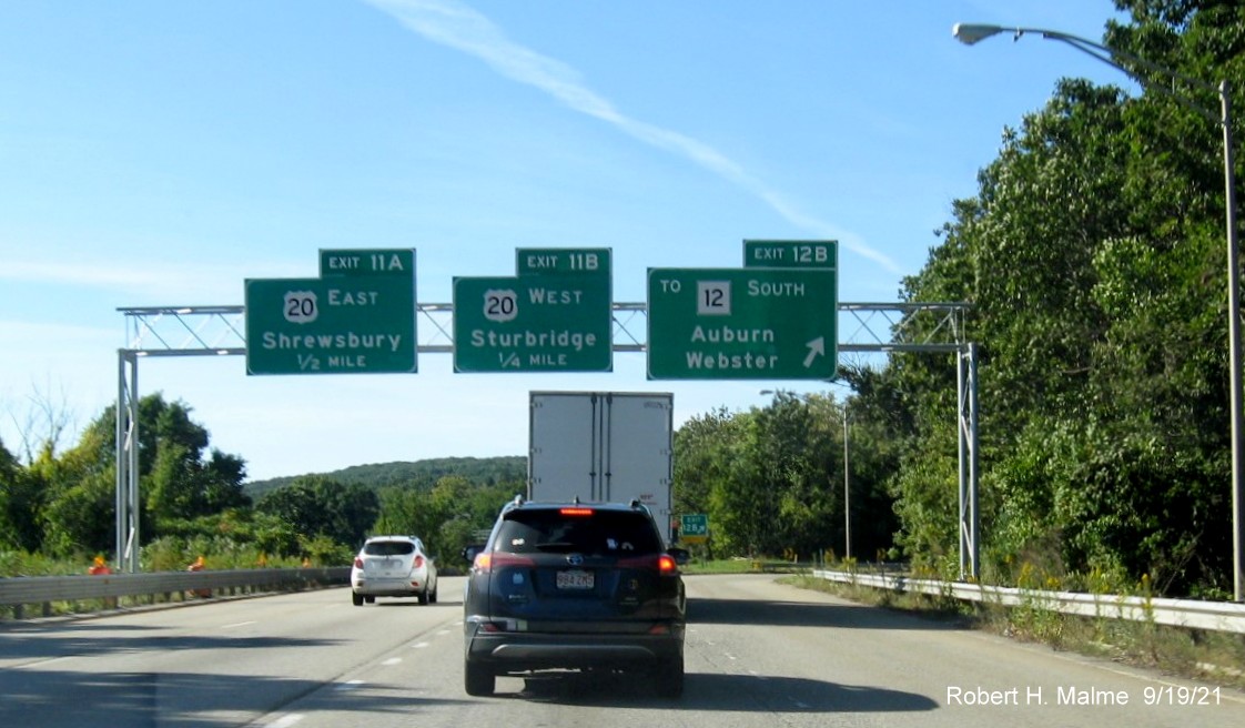 Image of newly placed overhead ramp sign for To MA 12 South exit with new milepost based exit number on I-290 West in Auburn, September 2021
