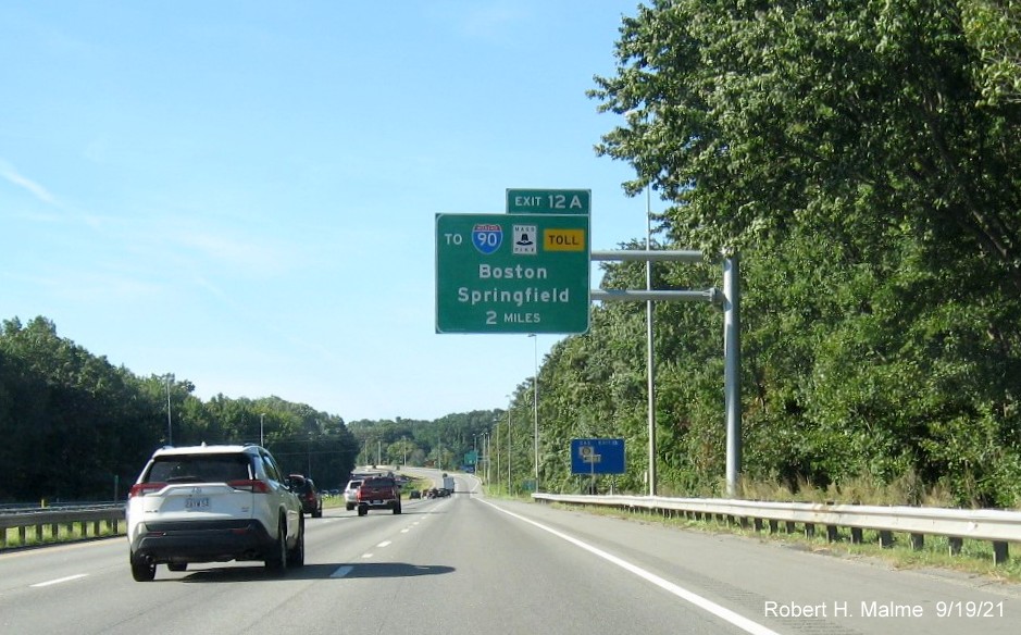 Image of newly placed 2 miles advance overhead sign for To I-90/Mass Pike exit with new milepost based exit number on I-290 West in Auburn, September 2021
