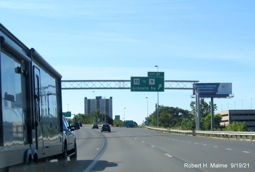 Image of recently placed overhead ramp sign for MA 70 to MA 9 exit with new milepost based exit number on I-290 West in Worcester, September 2021