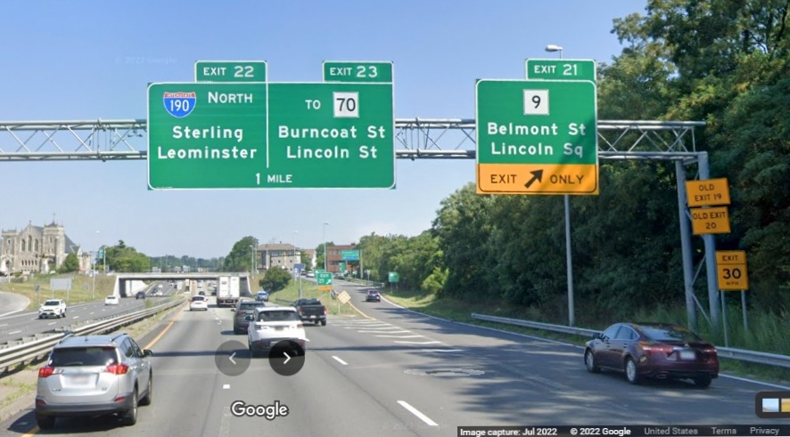 Image of overhead signage at ramp for MA 9 exit with new milepost based exit numbers on I-290 East in Worcester, Google Maps Street View, July 2022