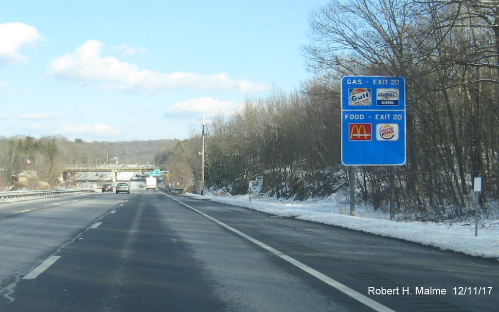 Image of blue service sign for RI 122 exit on I-295 North in Cumberland with new exit numbers