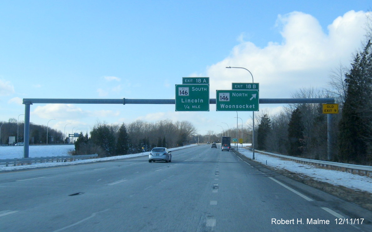 Image of overhead signs at RI 146 exits on I-295 South in Lincoln with new exit numbers