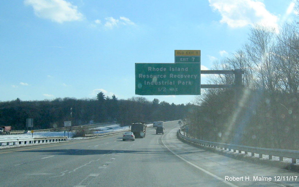 Image of overhead 1/2 mile advance sign for RI Industrial Park exit on I-295 South in Cranston, RI, with new exit number