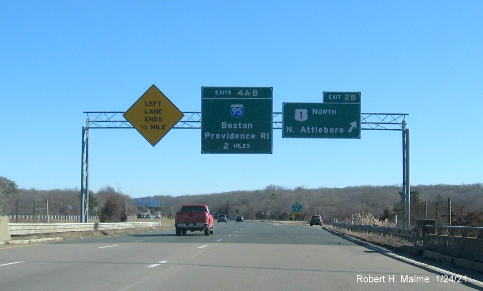 Image of overhead signage at ramp for US 1 North exit with new milepost based exit number on I-295 North in North Attleborough, January 2021