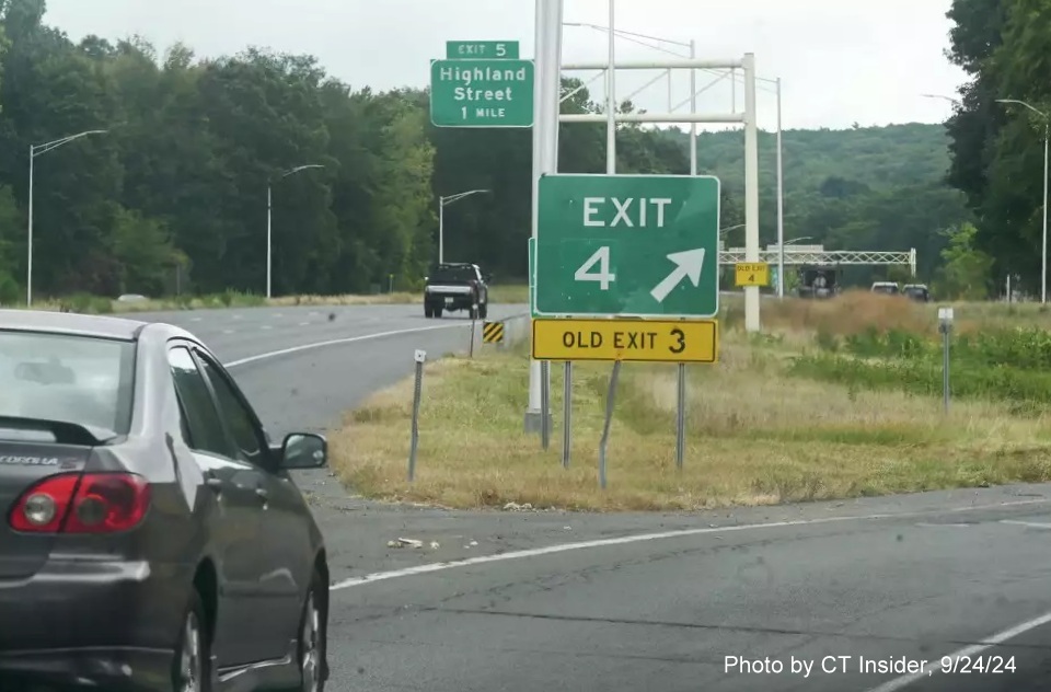 Image of gore sign for CT 83 exit with new milepost based exit number and yellow Old Exit 3 sign attached below, from CTInfo article, September 2024