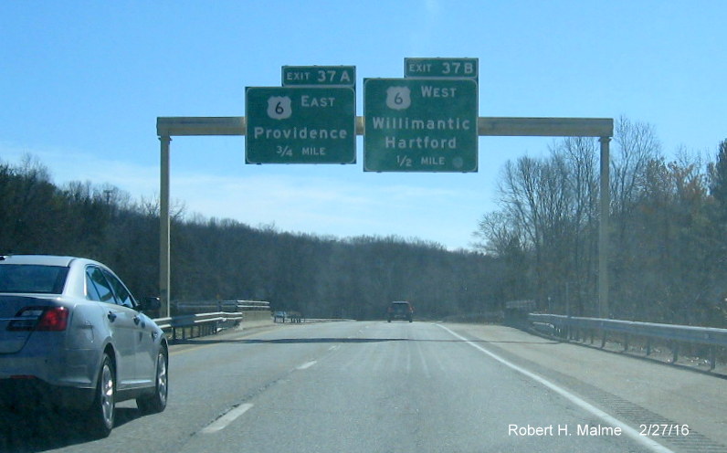 Image of new overhead advance signs with new milepost based numbers for US 6 exit on I-395 South in Danielson, CT