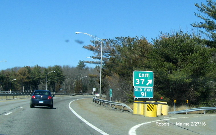 Image of new exit gore signage with old exit number tab for US 6 West exit on I-395 North in Danielson