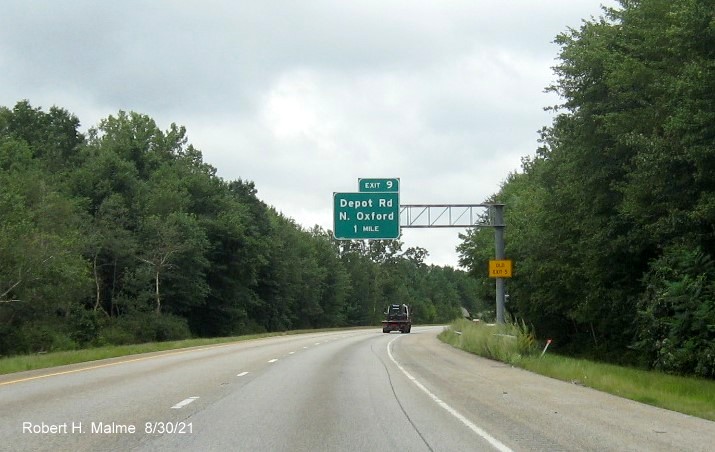 Image of 1 mile advance overhead sign for Depot Road exit with new milepost based exit number and yellow Old Exit 5 advisory sign on support on I-395 South in Oxford, August 2021