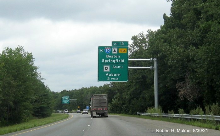 Image of 2 miles advance overhead sign for I-90/Mass Pike and MA 12 exit with new milepost based exit number on I-395 North in Oxford, August 2021