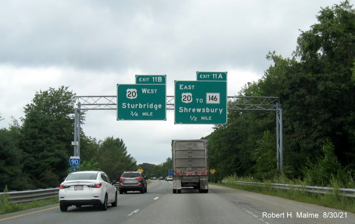 Image of 1 mile advance sign for I-90/Mass Pike and MA 12 exit with new milepost based exit number and yellow Old Exit 7 advisory sign on support on I-395 North in Oxford, August 2021