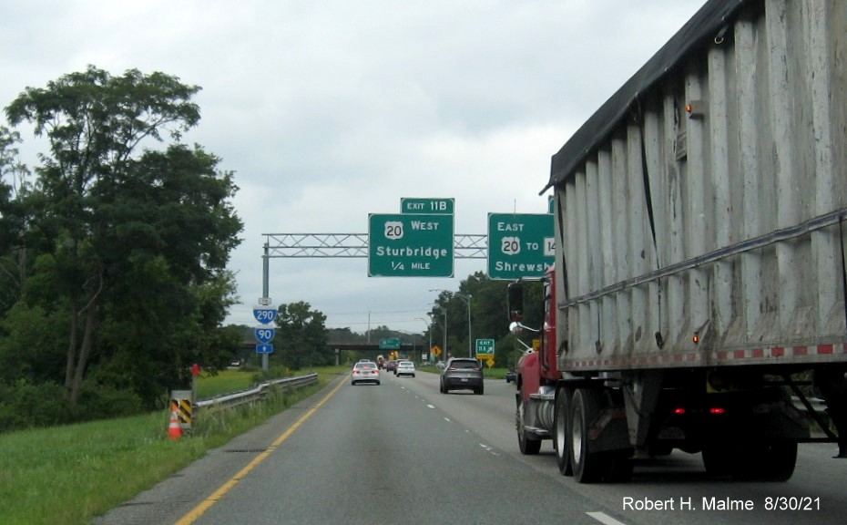 Image of overhead advance signage at US 20 West to MA 146 exit with new milepost based exit numbers on I-395 North in Auburn, August 2021