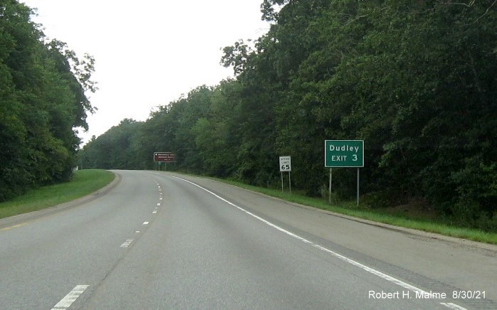 Image of ground mounted auxiliary sign for MA 16 exit with new milepost based exit number on I-395 South in Webster, August 2021 with 