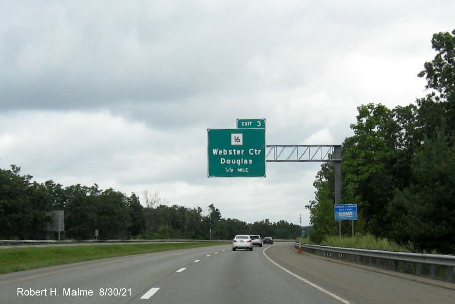 Image of 1/2 mile advance overhead sign for MA 16 exit with new milepost based exit number on I-395 North in Webster, August 2021 with 