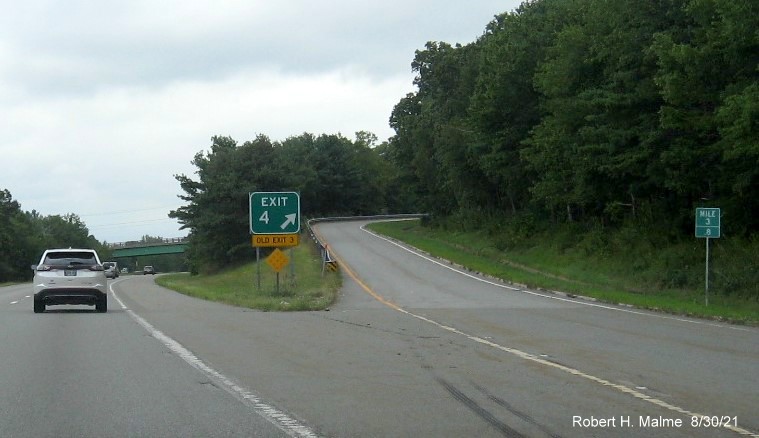 Image of gore sign for  Road exit with new milepost based exit number and yellow Old Exit 3 sign attached below on I-395 North in Webster, August 2021