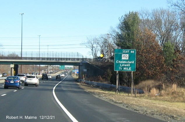 Image of ground mounted temporary 1/2 mile advance sign for MA 110 exit on I-495 North in Chelmsford, December 2021