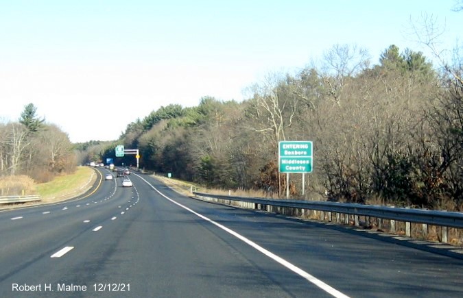 Image of recently placed town and county line sign for Rest Area on I-495 North in Harvard, December 2021