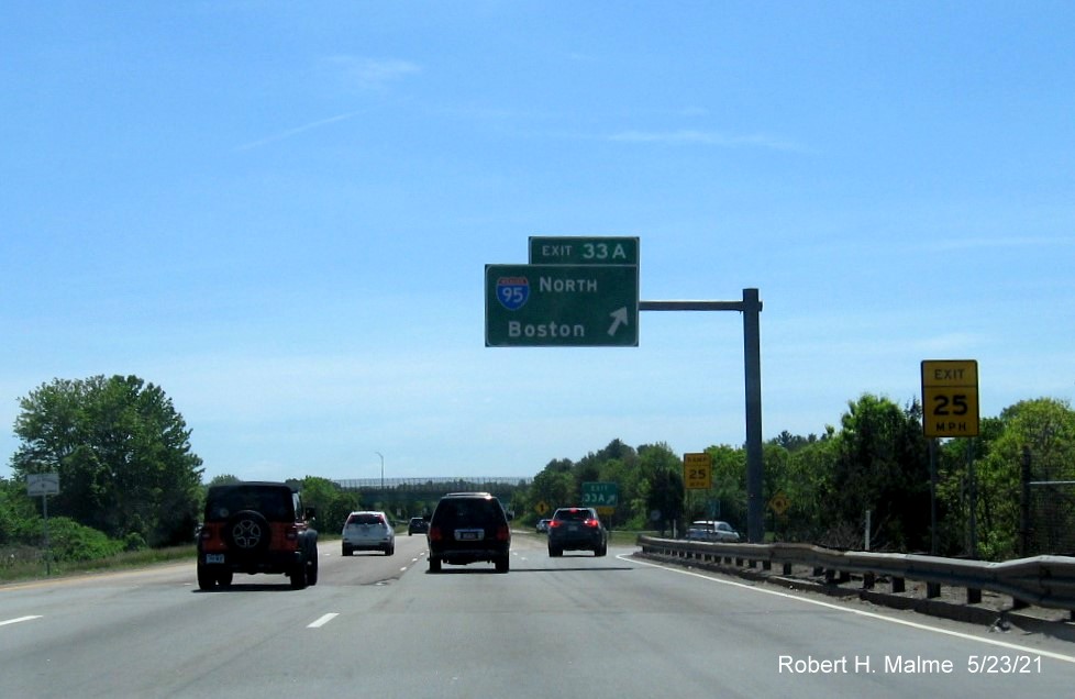Image of overhead ramp sign for I-95 North exit with new milepost based exit number on I-495 South in Mansfield, May 2021