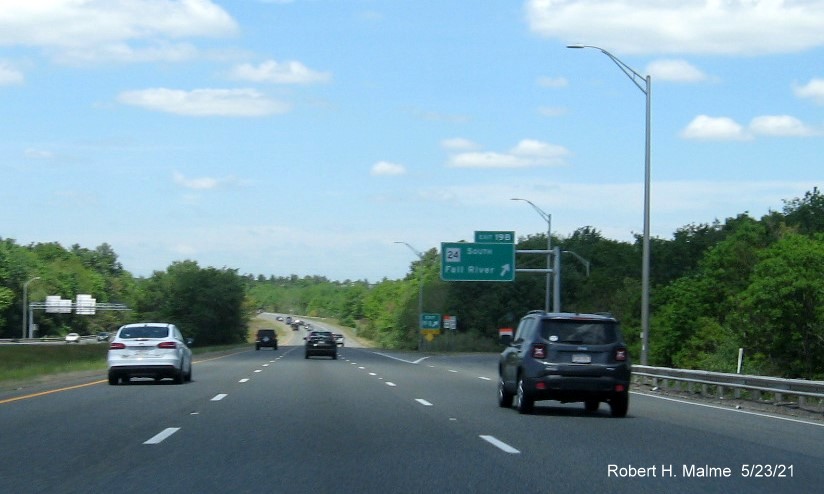 Image of overhead ramp sign for MA 24 South exit with new milepost based exit number on I-495 North in Raynham, May 2021