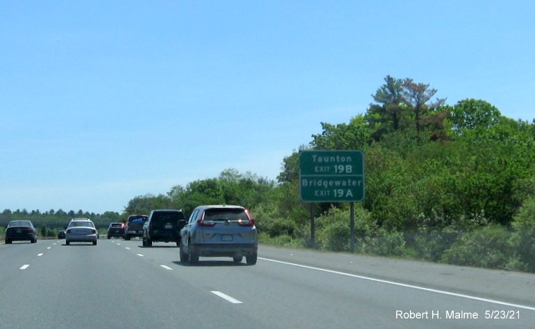 Image of auxiliary sign for MA 24 exits with new milepost based exit numbers on I-495 South in Raynham, May 2021