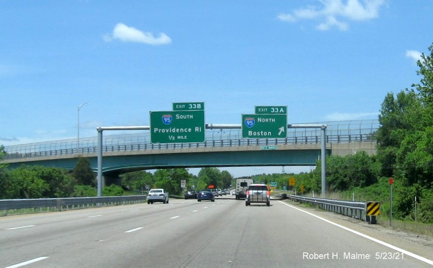 Image of overhead signage at ramp for I-95 North exit with new milepost based exit number on I-495 North in Mansfield, May 2021